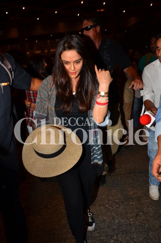 Preity and hubby Gene arrive in time for star studded Mumbai reception