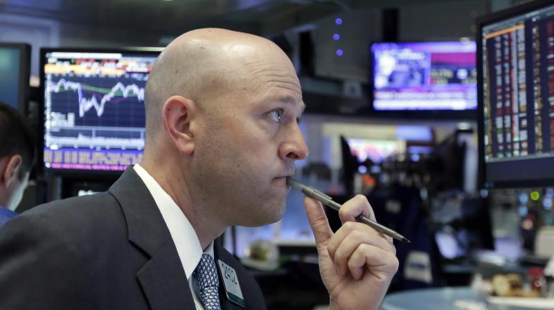 Specialist Jay Woods works on the floor of the New York Stock Exchange. (Photo: AP)