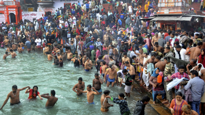Devotees take a dip in the river Ganga on the first day of Ardh Kumbh festival at Haridwar. (Photo: AP)