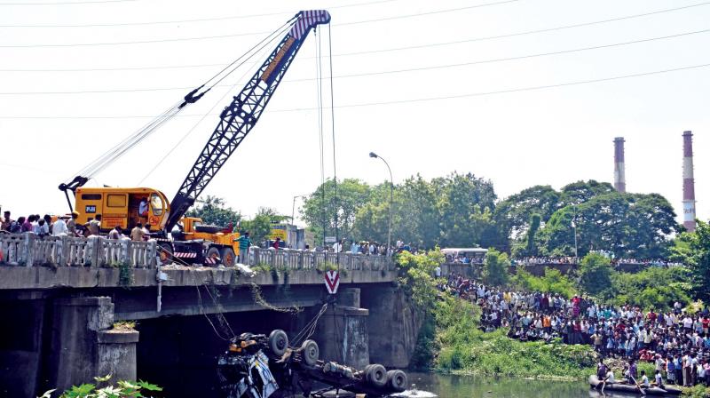 Heavy duty crane fishing out the tipper lorry from Buckingham canal,  on Monday (Photo: DC)