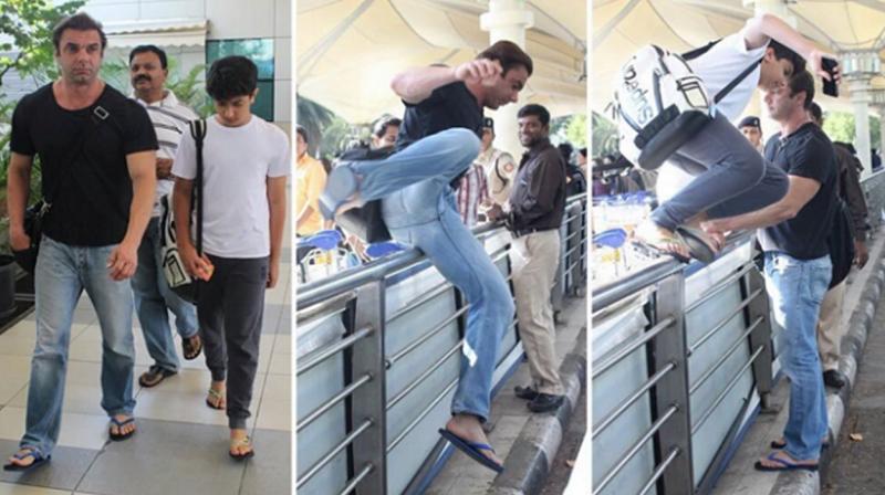 Sohail hopped, skipped and jumped off the barricade with his son at the airport. Photo: Sohail Khans Fan Club Sohail hopped, skipped and jumped off the barricade with his son at the airport. Photo: Sohail Khans Fan Club