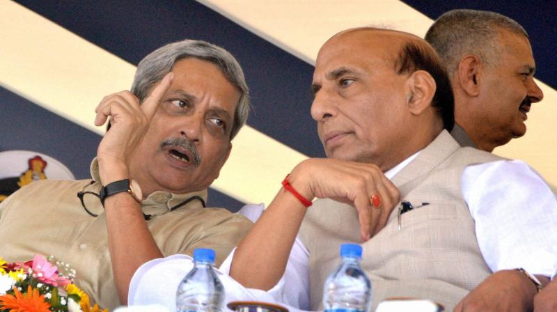 Defence Minister Manohar Parrikar and Home Minister Rajnath Singh at Goa Shipyard Ltd, Vasco on Friday during the commissining ceremony of the OPV Sarathi into India Coast Guard. (Photo: PTI)