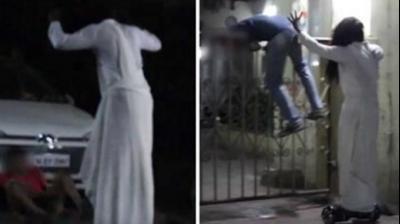 The video features the host dressed in a white sari moving about in a spooky manner on a hoverboard in the dead of the night. (Credit: YouTube)