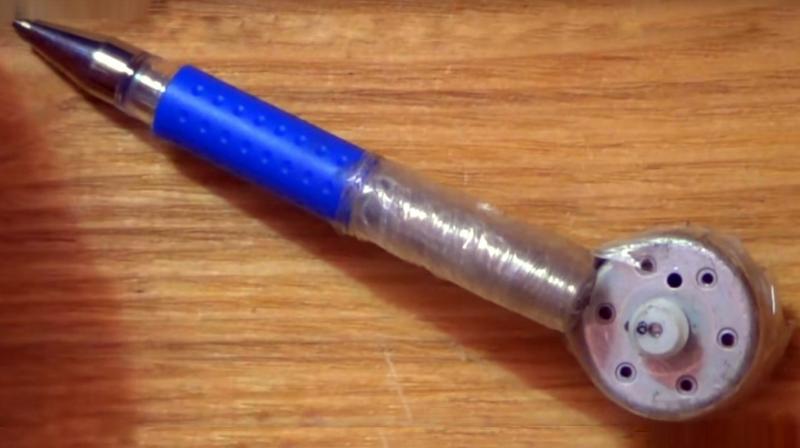 . Check out the video how you can build your own mini tattoo machine using and standard ball point pen and a motor from an old toy.