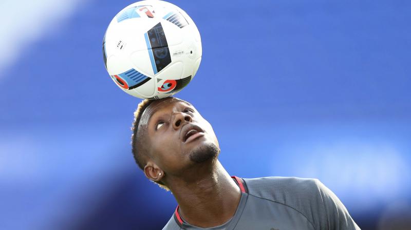 Belgiums Divock Origi controls the ball as he attends a training session at the Grand Stade in Decines-Charpieu, near Lyon, France. (Photo: AP)