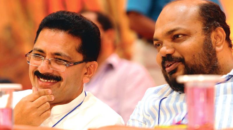 Minister for Local Administration K.T. Jaleel with CPM district secretary P. Rajeev at the inauguration of Kerala Municipal and Corporation Staff Unions state convention in Kochi on Friday. (Photo: ARUNCHANDRA BOSE)