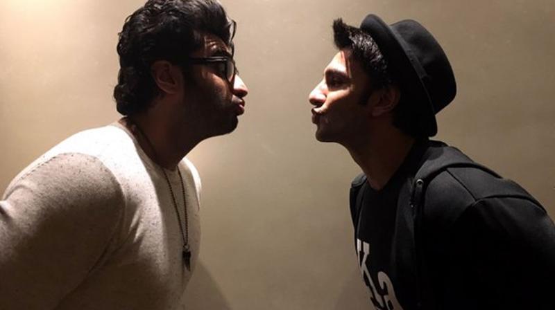 Ranveer Singh showed his love and support towards his buddy Arjun Kapoor, in the best possible way at the Ki And Ka special screening. Photo: Viral Bhayani