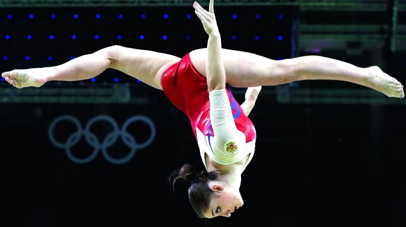 Olympics: U.S. gymnasts wobble way to fifth place