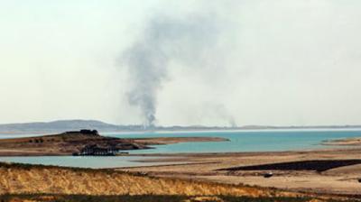 Smoke rises during airstrikes targeting Islamic State militants at the Mosul Dam outside Mosul. (Photo: AP)