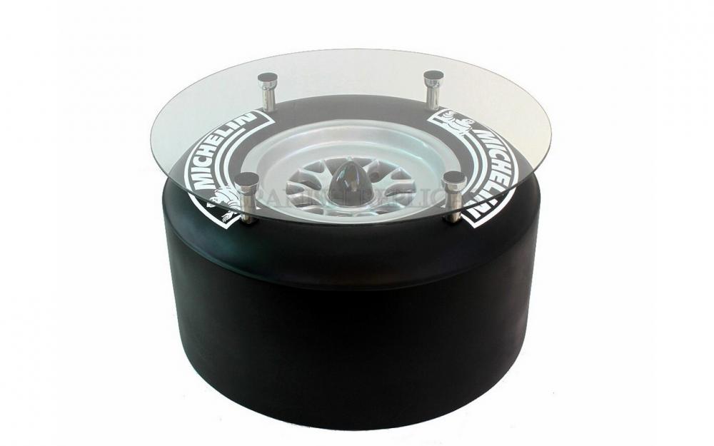 Place four chrome legs and slap a round glass to make a beautiful coffee table. Place four chrome legs and slap a round glass to make a beautiful coffee table.