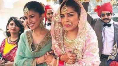 Nimrat stuck by Rubina's side as she walked her to the mandap.