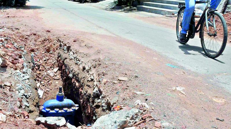 Water pipeline works started by the VMC remain incomplete at Maruthi Nagar in Vijayawada. (Photo: DC)