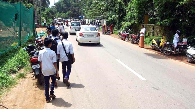 Accidents involving schoolchildren are common on the state highway from Kuttiadi Kalanagaram to Payanthong, including one this week, where two boys died on the spot. (Photo: DC)