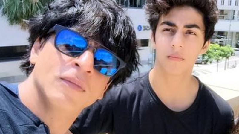 Shah Rukh shared a video of his eldest son Aryan, playing the Fan anthem on his guitar.