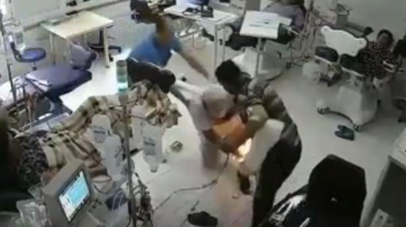 CCTV footage of the incidence shows a man, later identified as 57-year-old Cenaj Lefter, walking calmly towards a patient who is seen undergoing the dialysis procedure. (Photo: Video grab) CCTV footage of the incidence shows a man, later identified as 57-year-old Cenaj Lefter, walking calmly towards a patient who is seen undergoing the dialysis procedure. (Photo: Video grab)