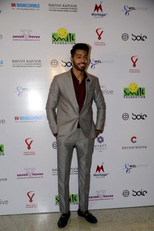 Team India cricketer Hardik Pandya looked dapper as he didn't hesitate posing for photographers at the do.