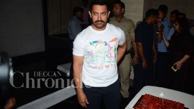 Aamir Khan celebrated his birthday with the media and a few fans at his residence on Monday afternoon.