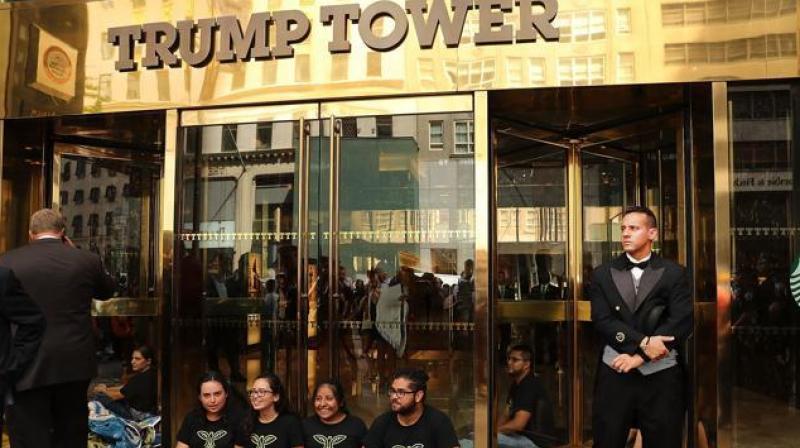 Protesters block the entrance to Trump Tower in Manhattan before being arrested on August 31, 2016 in New York City. (Photo: AFP) Protesters block the entrance to Trump Tower in Manhattan before being arrested on August 31, 2016 in New York City. (Photo: AFP)