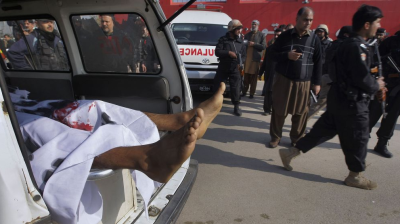 At least 21 people died in an armed assault on a university in Pakistan Wednesday, where witnesses reported two large explosions as security forces moved in under dense fog to halt the bloodshed. (Photo: AP) At least 21 people died in an armed assault on a university in Pakistan Wednesday, where witnesses reported two large explosions as security forces moved in under dense fog to halt the bloodshed. (Photo: AP)
