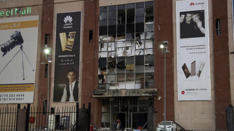 Damage at the front of the shopping mall building in the aftermath of car bomb explosion in Baghdad. (Photo: AP) Damage at the front of the shopping mall building in the aftermath of car bomb explosion in Baghdad. (Photo: AP)