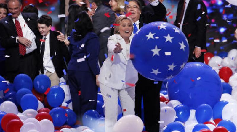 Democratic presidential nominee Hillary Clinton reaches for a falling balloon at the conclusion of the Democratic National Convention in Philadelphia. (Photo: AP) Democratic presidential nominee Hillary Clinton reaches for a falling balloon at the conclusion of the Democratic National Convention in Philadelphia. (Photo: AP)