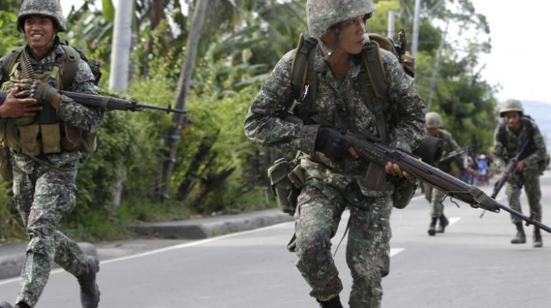 About 45 soldiers and Muslim rebels have been killed on Jolo island since Thursday when the army launched an air-and-ground assault on the main base of the militants after President Rodrigo Duterte ordered the Abu Sayyaf to be "destroyed". (Representational Image) About 45 soldiers and Muslim rebels have been killed on Jolo island since Thursday when the army launched an air-and-ground assault on the main base of the militants after President Rodrigo Duterte ordered the Abu Sayyaf to be "destroyed". (Representational Image)