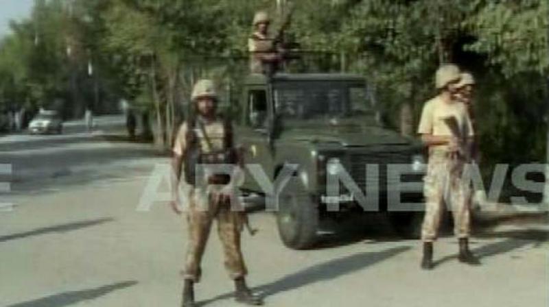 At least four suicide bombers attacked the Christian Colony in Pakistan’s Peshawar on Friday morning. (Photo: Videograb) At least four suicide bombers attacked the Christian Colony in Pakistan’s Peshawar on Friday morning. (Photo: Videograb)
