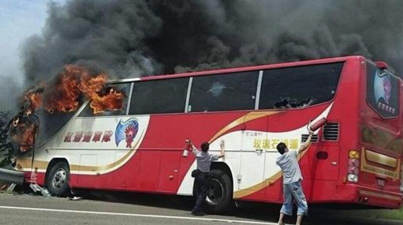 Many of the bodies were badly charred, some of them piled in front of the unopened emergency exit, Taiwan's official Central News Agency and other media reported. (Photo: AP) Many of the bodies were badly charred, some of them piled in front of the unopened emergency exit, Taiwan's official Central News Agency and other media reported. (Photo: AP)