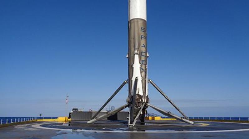 This photo provided by SpaceX shows the first stage of the company's Falcon rocket after it landed on a platform in the Atlantic Ocean just off the Florida coast on Friday This photo provided by SpaceX shows the first stage of the company's Falcon rocket after it landed on a platform in the Atlantic Ocean just off the Florida coast on Friday