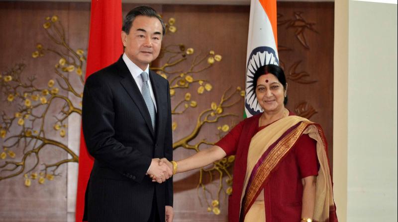 External Affairs Minister Smt Sushma Swaraj with Chinese Foreign Minister Mr Wang Yi. (Photo: Twitter) External Affairs Minister Smt Sushma Swaraj with Chinese Foreign Minister Mr Wang Yi. (Photo: Twitter)