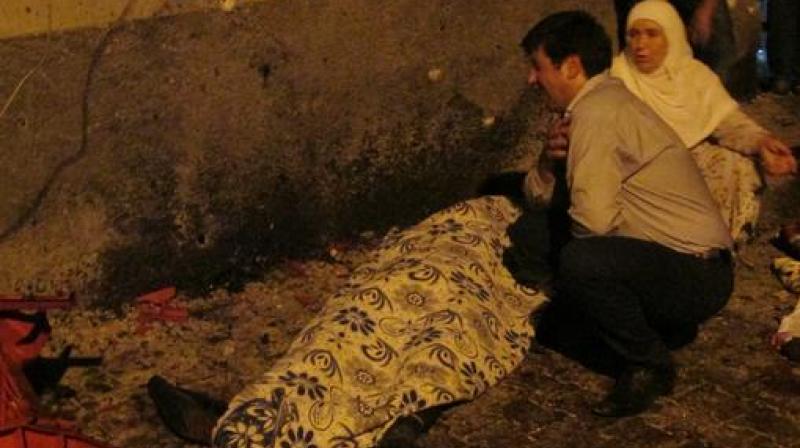A man cries over a covered body after an explosion in Gaziantep, southeastern Turkey. (Photo: AP) A man cries over a covered body after an explosion in Gaziantep, southeastern Turkey. (Photo: AP)