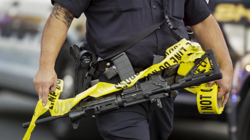 Moments later, as police gave chase, the suspect shot into a car, striking a man and a woman in the chest. (Photo: Representational Image) Moments later, as police gave chase, the suspect shot into a car, striking a man and a woman in the chest. (Photo: Representational Image)