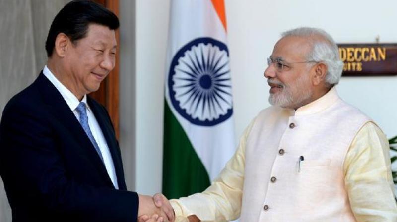China and India pledged on Thursday to further promote cooperation among the BRICS nations and discussed issues such as cyber security, energy security and anti-terrorism. (Photo: AFP) China and India pledged on Thursday to further promote cooperation among the BRICS nations and discussed issues such as cyber security, energy security and anti-terrorism. (Photo: AFP)