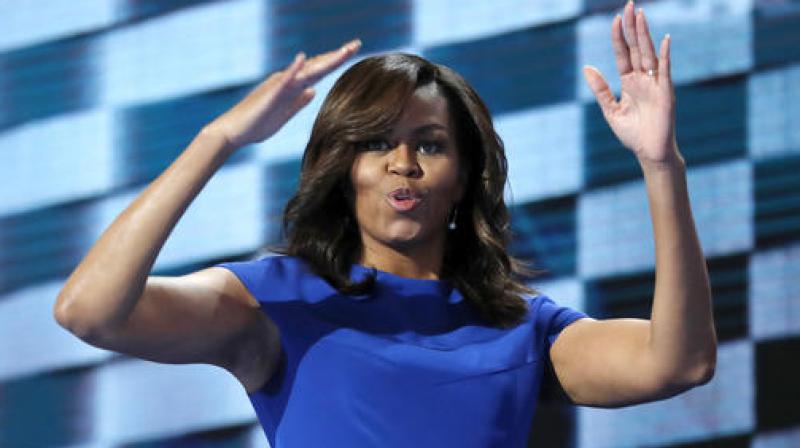In this election, there is only one person who I trust with that responsibility, only one person who I believe is truly qualified to be president of the United States and that is our friend Hillary Clinton, says Michelle Obama. (Photo: AP) In this election, there is only one person who I trust with that responsibility, only one person who I believe is truly qualified to be president of the United States and that is our friend Hillary Clinton, says Michelle Obama. (Photo: AP)