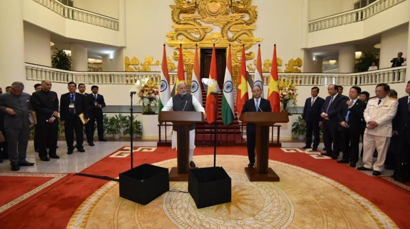 Prime Minister Narendra Modi and his Vietnamese counterpart Nguyen Xuan Phuc at a joint media briefing in Hanoi, Vietnam. (Photo: Twitter) Prime Minister Narendra Modi and his Vietnamese counterpart Nguyen Xuan Phuc at a joint media briefing in Hanoi, Vietnam. (Photo: Twitter)