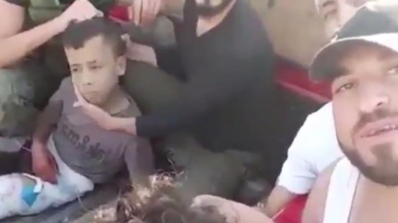 The Britain-based Syrian Observatory for Human Rights confirmed that the video depicts rebel fighters. (Photo: Videograb) The Britain-based Syrian Observatory for Human Rights confirmed that the video depicts rebel fighters. (Photo: Videograb)