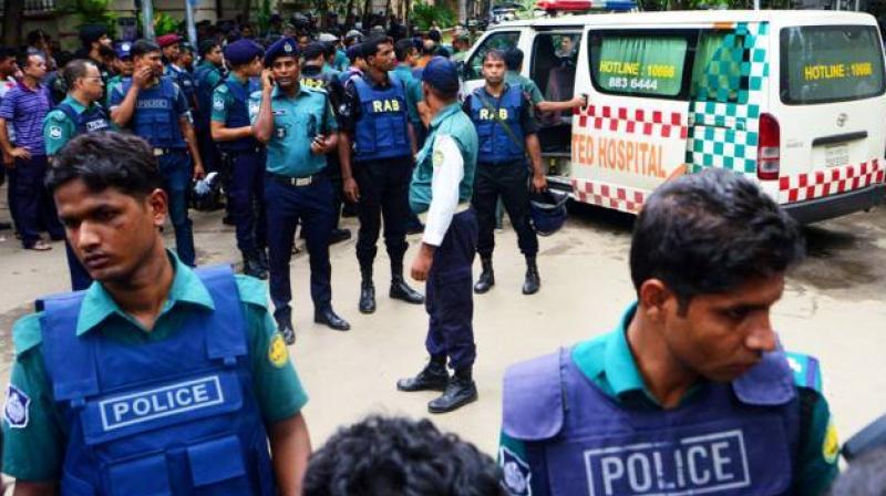 Security agencies have arrested dozens of JMB militants with officials calling some of them as masterminds of the outfit as a nationwide anti-militant security clampdown is underway since the July 1 attack. (Photo: Representational Image/AFP) Security agencies have arrested dozens of JMB militants with officials calling some of them as masterminds of the outfit as a nationwide anti-militant security clampdown is underway since the July 1 attack. (Photo: Representational Image/AFP)