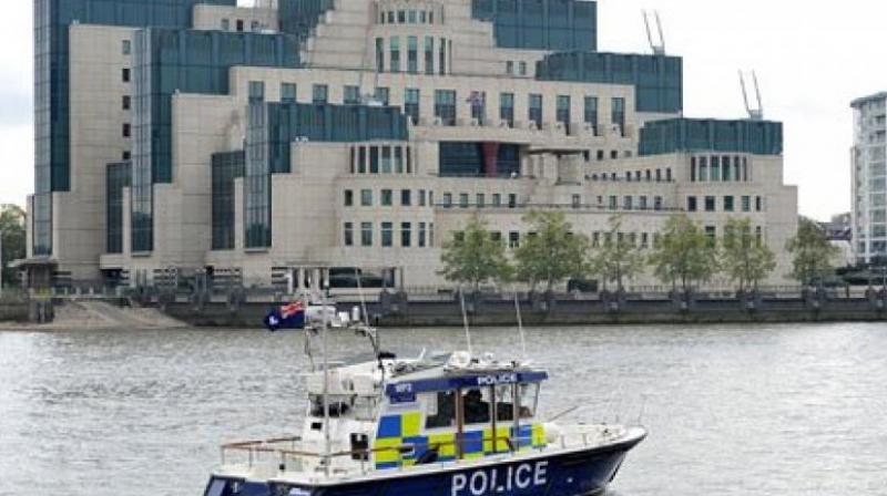 A police boat patrols the river Thames near the MI6 headquarters in London. (Photo: AP) A police boat patrols the river Thames near the MI6 headquarters in London. (Photo: AP)