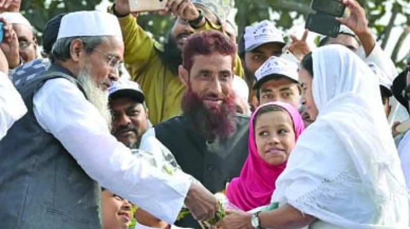 Siddiqullah Chowdhury, General Secretary, Jamiat Ulema-e-Hind with West Bengal Chief Minister Mamata Banerjee. (Photo: PTI)