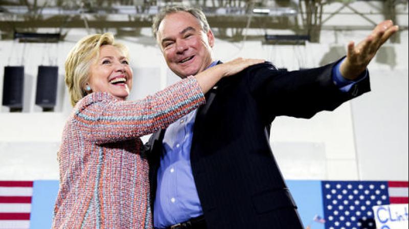 Democratic presidential candidate Hillary Clinton, accompanied by Sen. Tim Kaine, D-Va., speaks at a rally at Northern Virginia Community College in Annandale. (Photo: AP) Democratic presidential candidate Hillary Clinton, accompanied by Sen. Tim Kaine, D-Va., speaks at a rally at Northern Virginia Community College in Annandale. (Photo: AP)