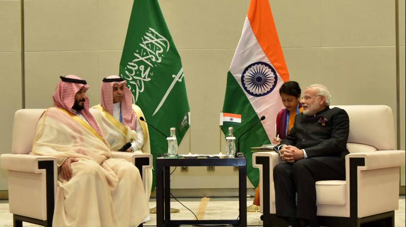 Prime Minister Narendra Modi with the Deputy Crown Prince of Saudi Arabia Mohammad Bin Salman at G20 Summit 2016 in Hangzhou, China, on Sunday. (Photo: PIB) Prime Minister Narendra Modi with the Deputy Crown Prince of Saudi Arabia Mohammad Bin Salman at G20 Summit 2016 in Hangzhou, China, on Sunday. (Photo: PIB)