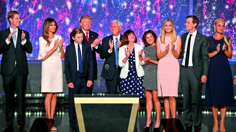 Republican Presidential Candidate Donald Trump, and Republican Vice Presidential nominee Gov. Mike Pence of Indiana with their families at the conclusion of the Republican National Convention in Cleveland. (Photo: AFP) Republican Presidential Candidate Donald Trump, and Republican Vice Presidential nominee Gov. Mike Pence of Indiana with their families at the conclusion of the Republican National Convention in Cleveland. (Photo: AFP)